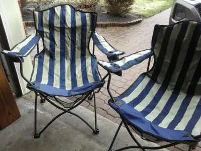 2 lightly used Woods Folding cloth Armchairs. These are oversized with mesh storage under seat and d...