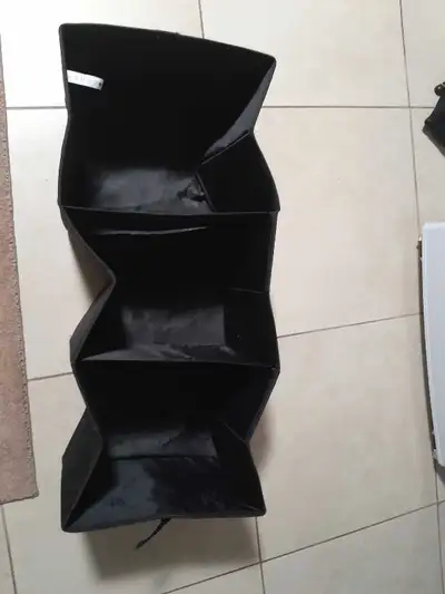 Folding car organizer. 3 compartments. Can go down to one. Or fold down completely if you don't need...