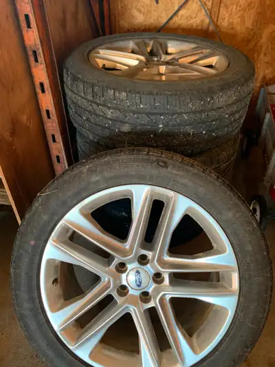 255/50R20 Set of 4 OEM Ford Explorer rims and tires. Rims are in okay shape. Have the typical corros...