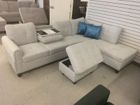 New In boxes!! Light Grey Sofa with Storage ottoman for $899