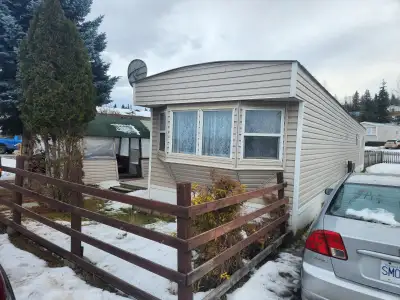 1975 12x68 mobile with addition. Must be moved. Newer furnace, hot water tank, roof, windows, vinyl...