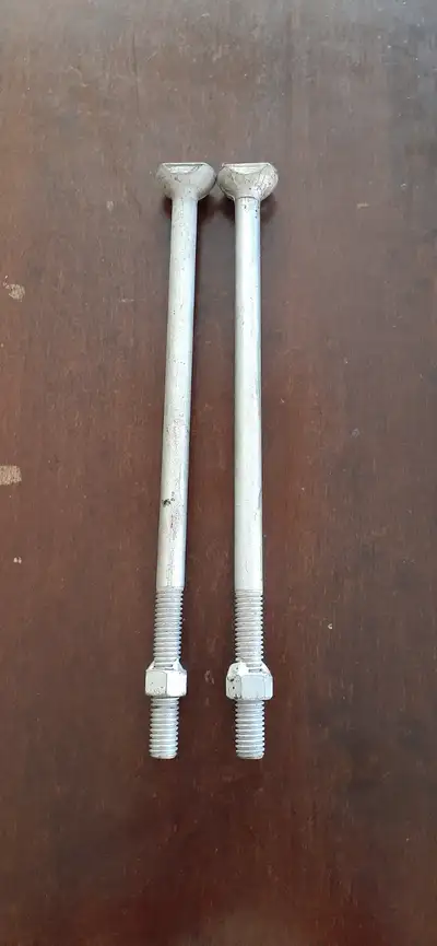 1963-66 Front spare tire bolt kit w/ welded nut 9 5/8". 2 required. Original N.O.S. Cad plated bolts...