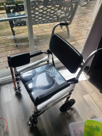 This multi purpose commode wheelchair w/ leg/ foot support, View more