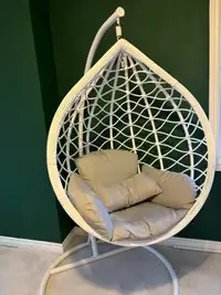 Stylish White Egg Chair with Grey Cushions