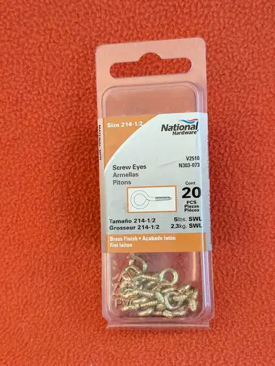 Package of 20 1/2-inch brass finish metal screw eyes, View more
