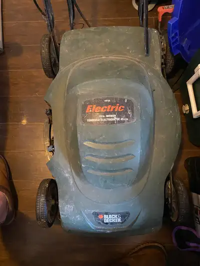 Old school Black & Decker electric lawnmower. Was using at camp last summer. No longer needed. Works...