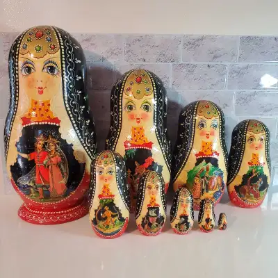 This delightful New set of vintage Russian autographed nesting dolls, also known as Matryoshka dolls...