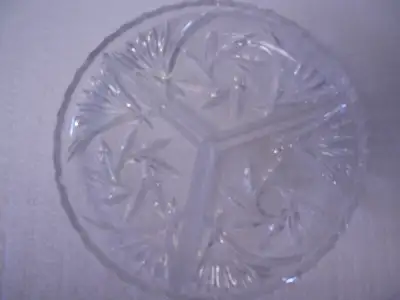 Round Pinwheel crystal three section dish Suggested uses; pickles, relish, pieces of vegetables Diam...