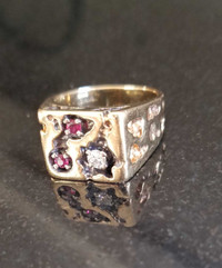 Solid gold ring with real diamond and 2 rubies