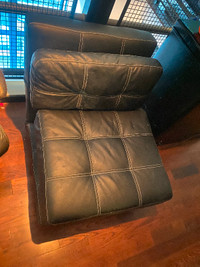 Leather Chair convert into a single bed for guests