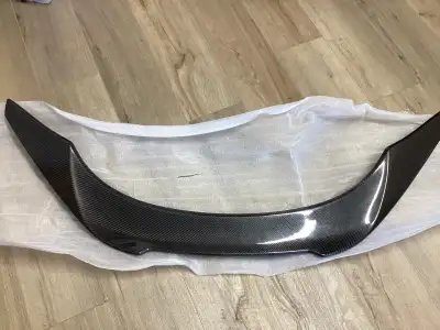 Upgrade your vehicle's aesthetic with this sleek, brand-new real carbon fiber rear spoiler designed...