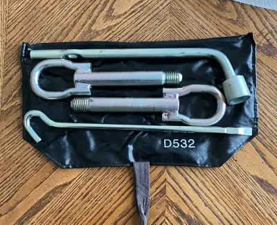 A NEW OEM SET with tool bag, only $35 (costs over $150 new). Might also fit other vehicles.