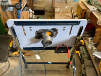  Router table  adjustable, metal frame, and Mastercraft router .