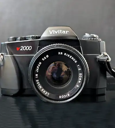 I am selling the following: - Vivitar V2000 SLR Film Camera Body - 35-70mm F/3.5-4.8 Zoom Lens (pent...