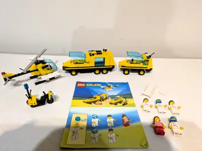 Classic Lego set from 1992. Includes helicopter, 2 trucks, motorcycle and 5 mini figures. Complete s...