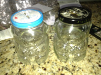 2 vintage Kraft character glass jars for sale