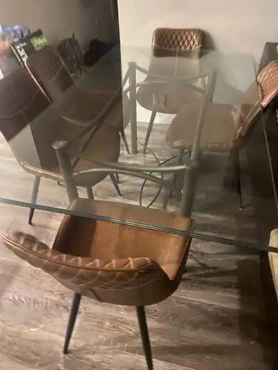 Good condition , with six chairs. Serious inquires , thick glass table. Reason for selling : wantin...