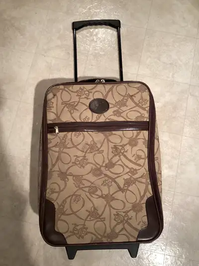 NAUTICA 22IN DARK & LIGHT BROWN CARRYON SUITCASE Measures approx. 22 Inches Tall 13.5 Inches Wide 7....