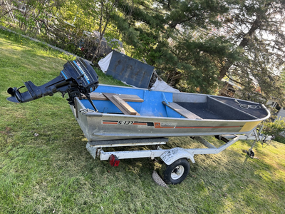 14-foot aluminum boat with a 7.5 HP Mercury two-stroke (short shaft) motor. Includes a trailer with...