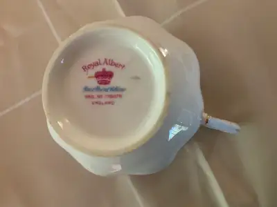 24 pieces. All pieces in beautiful condition, circa 1955. Genuine English China, no teapot. Will acc...