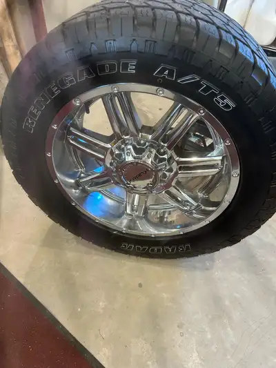 Selling a beautiful set of 8x6.5 chrome aluminum rims and excellent tires. Came off of a 2012 Ram 35...
