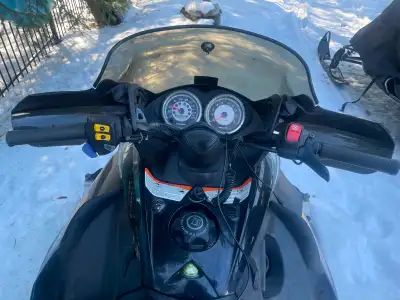 2004 Skidoo 800HO for sale. Good running condition. Comes with custom cover, reverse gear, pull star...