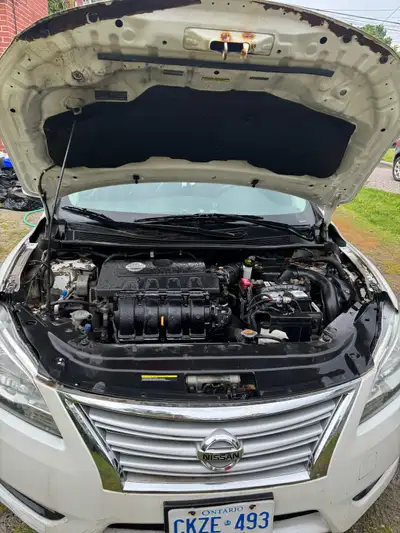 2014 Nissan Sentra, 170 822 km. Had starter replaced in 2020, rear CV Axle replaced/front outer tie...
