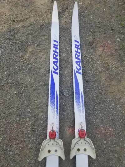 Karhu pair of adult cross country skis & poles. -Classic 150 made in Canada with Bearclaw waxless ba...