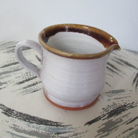 FS:   A Pottery Cup