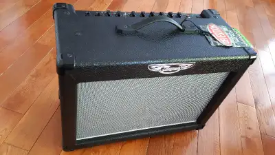 Purchased new, not used. Features a full-size cabinet (larger than other similarly priced amps) for...