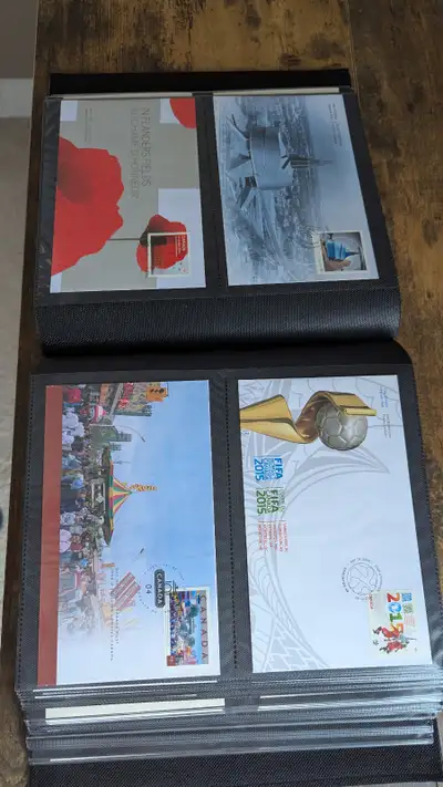 Over 140 Canada First Day Covers in a Light House Album, View more