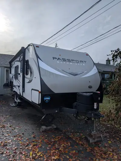 Open to reasonable offers. Keystone Passport 197RBWE 24ft "couple's carriage" with one queen bed and...
