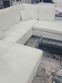 Cream sectional with ottoman