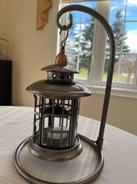 Decorative Lamp with candle inside.