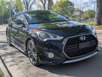 Sporty, fuel-efficient, and fun to drive – selling a well-maintained 2016 Hyundai Veloster Turbo wit...