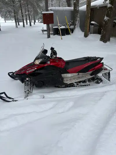 -Fuel injected four stroke -Runs perfectly -New carbides -121 size track -11,420km -heated handlebar...