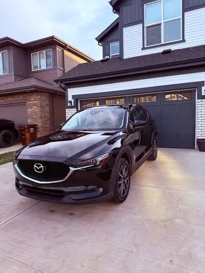 Mazda CX5 GT 2017 with winter wheels, 2 way remote starter. One owner, no accidents or claims. Clean...