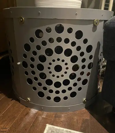 This circular dog crate is perfect for your little pup and also blends in seamlessly with your furni...