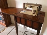 Imperial sewing machine with cabinet