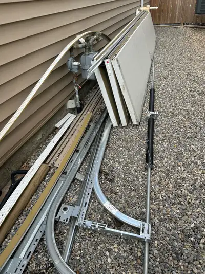 Garage door 16x28 with all parts except motor.