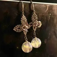 Butterfly pearl drop earrings