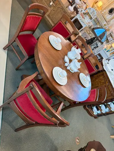 solid oak table with 4 leaves and 6 chairs , View more
