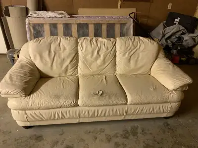 Natuzzi leather couch. Some wear and two tears in the seat leather. The structure is solid. Put a bl...