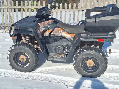 Four wheeler, great for trails and utility work. Heated handle bars, tow hitch, Padded passenger sea...