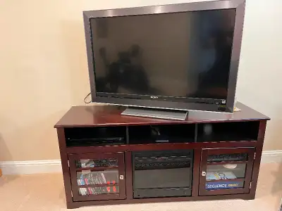 Beautiful electric fireplace in wood stand. Excellent condition, gives off good heat, especially in...