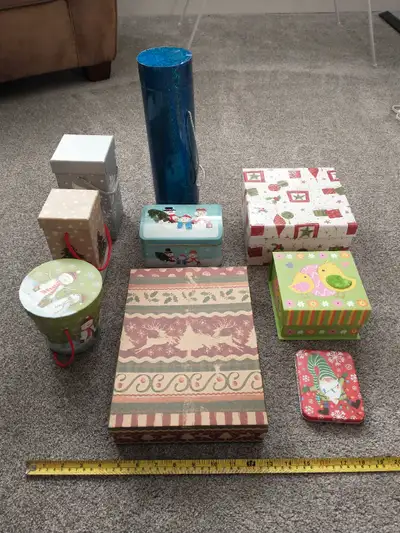 Easier than wrapping, a group of 9 gift boxes of various sizes (including a bottle tube and a new gi...