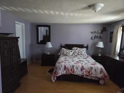 Bright, large 16x16 bedroom, shared bathroom, double closet, Large windows, overlooking garden, clos...