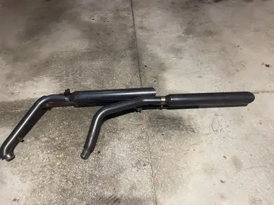 COMPLETE EXHAUST WITH HEAT SHIELDS FOR HD SOFTAIL. CAME OFF 2012 HERITAGE 103. SOUND GOOD. POWDER CO...