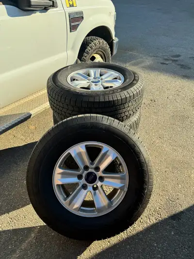 Selling our set of ford F150 rims Tires are pretty much brand new. Photos for reference. Shoot us an...