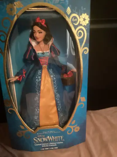 This is a M.I.B. Live action Snow White 17” doll asking $30.